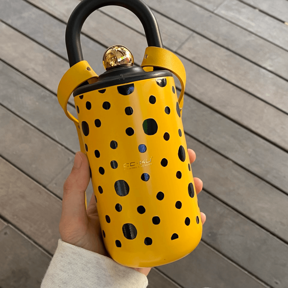Elegant Portable Coffee Cup with Black Polka Dots