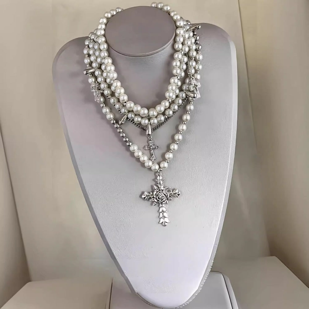 Imitation pearl multi-layered cross necklace is light and luxurious