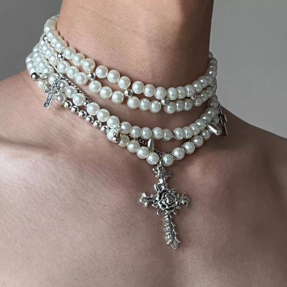 Imitation pearl multi-layered cross necklace is light and luxurious