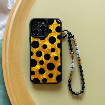 Stylish Gold and Black Polka Dot iPhone 15 Case