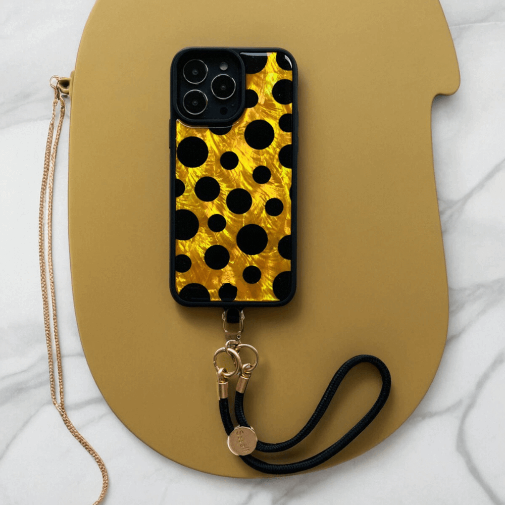 Stylish Gold and Black Polka Dot iPhone 15 Case