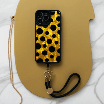 Stylish Gold and Black Polka Dot iPhone 15 Case